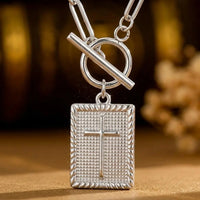 Carried By Faith silver cross pendant necklace close-up detail
