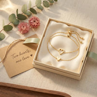Matching Hearts Bracelet Set in cream gift 
box with Two Hearts One Love card — 
gift-ready meaningful bond present