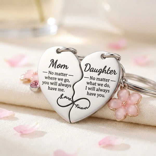 Mom and Daughter heart keychain engraved message close-up with infinity symbol