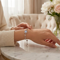 Daughter wearing silver Moon Stars bracelet on wrist Saturn moonstone celestial lifestyle