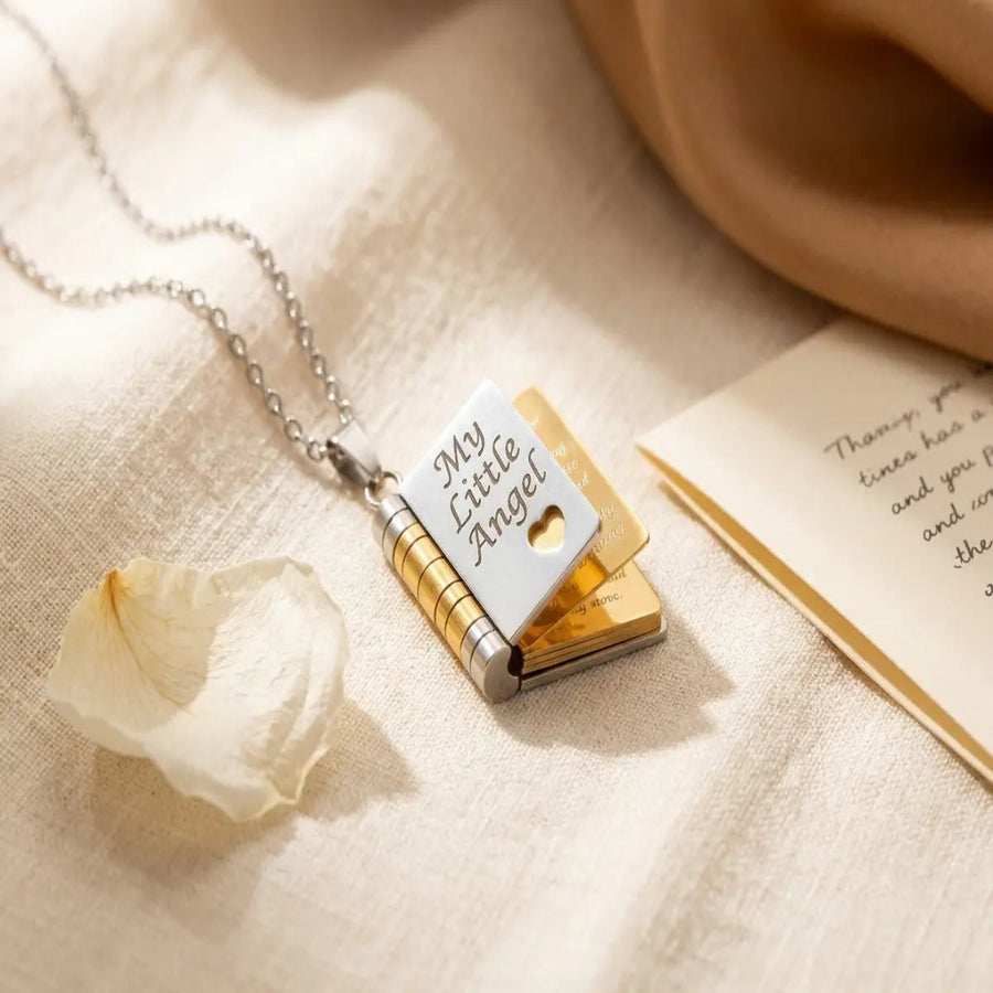 Real hinge — opens to 6 engraved pages.