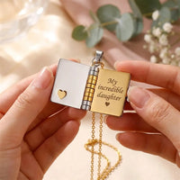 Open My Little Star locket revealing engraved 
message My incredible daughter on gold page 
with silver heart cutout — heartfelt mother 
daughter keepsake