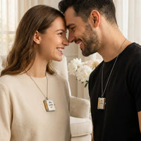 Couple wearing matching My Love book locket necklaces 
silver gold partner romantic intimate moment