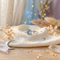 Star and Moon silver ring with scattered stars 
and baby's breath — dreamy celestial aesthetic 
gift for daughter who reaches for the stars