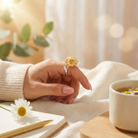 Young woman wearing You Are My Sunshine sunflower 
fidget ring on finger — calming mindfulness daily 
wear anxiety relief